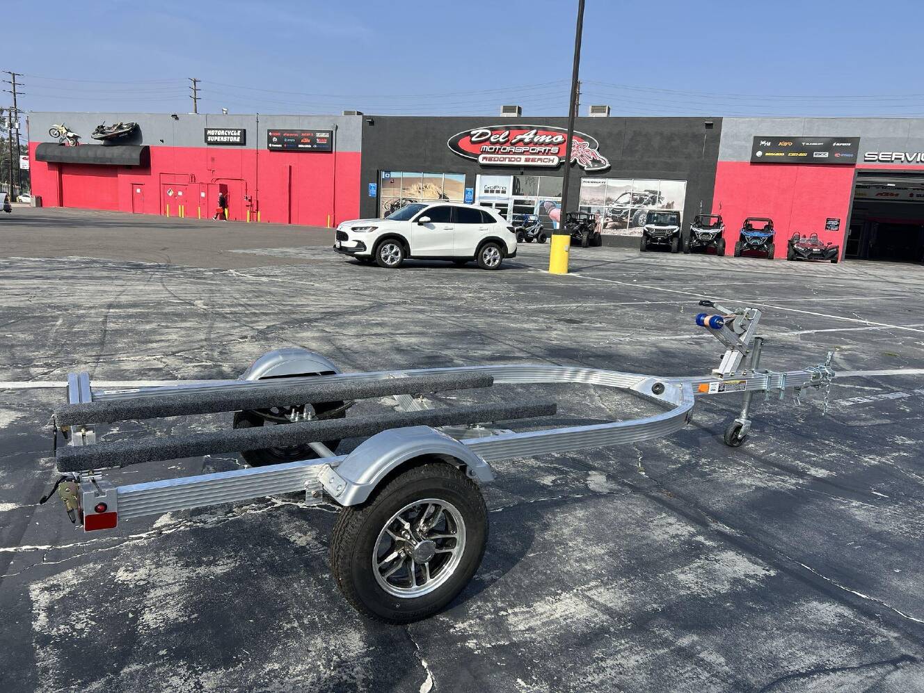 A photo of this 2026 Triton ELITE WCI PWC TRAILER W&sol; ALUMINUM WHEELS
