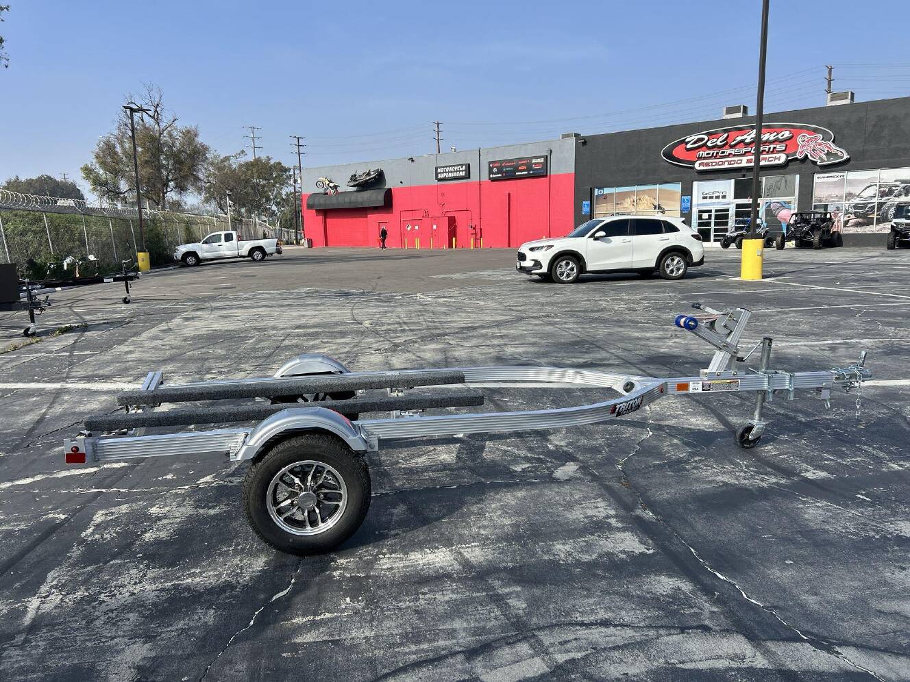 A photo of this 2026 Triton ELITE WCI PWC TRAILER W&sol; ALUMINUM WHEELS