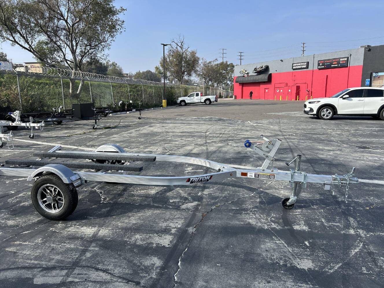 A photo of this 2026 Triton ELITE WCI PWC TRAILER W&sol; ALUMINUM WHEELS