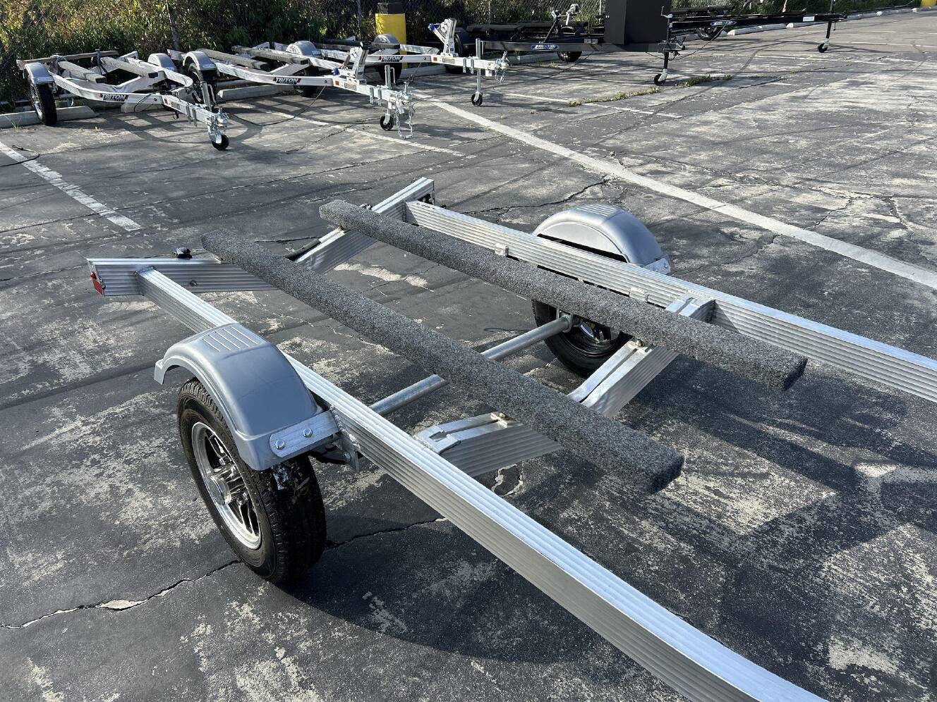 A photo of this 2026 Triton ELITE WCI PWC TRAILER W&sol; ALUMINUM WHEELS