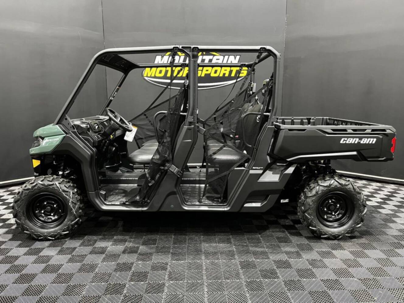 A photo of this 2026 Can-Am Defender MAX DPS HD7 Compass Green