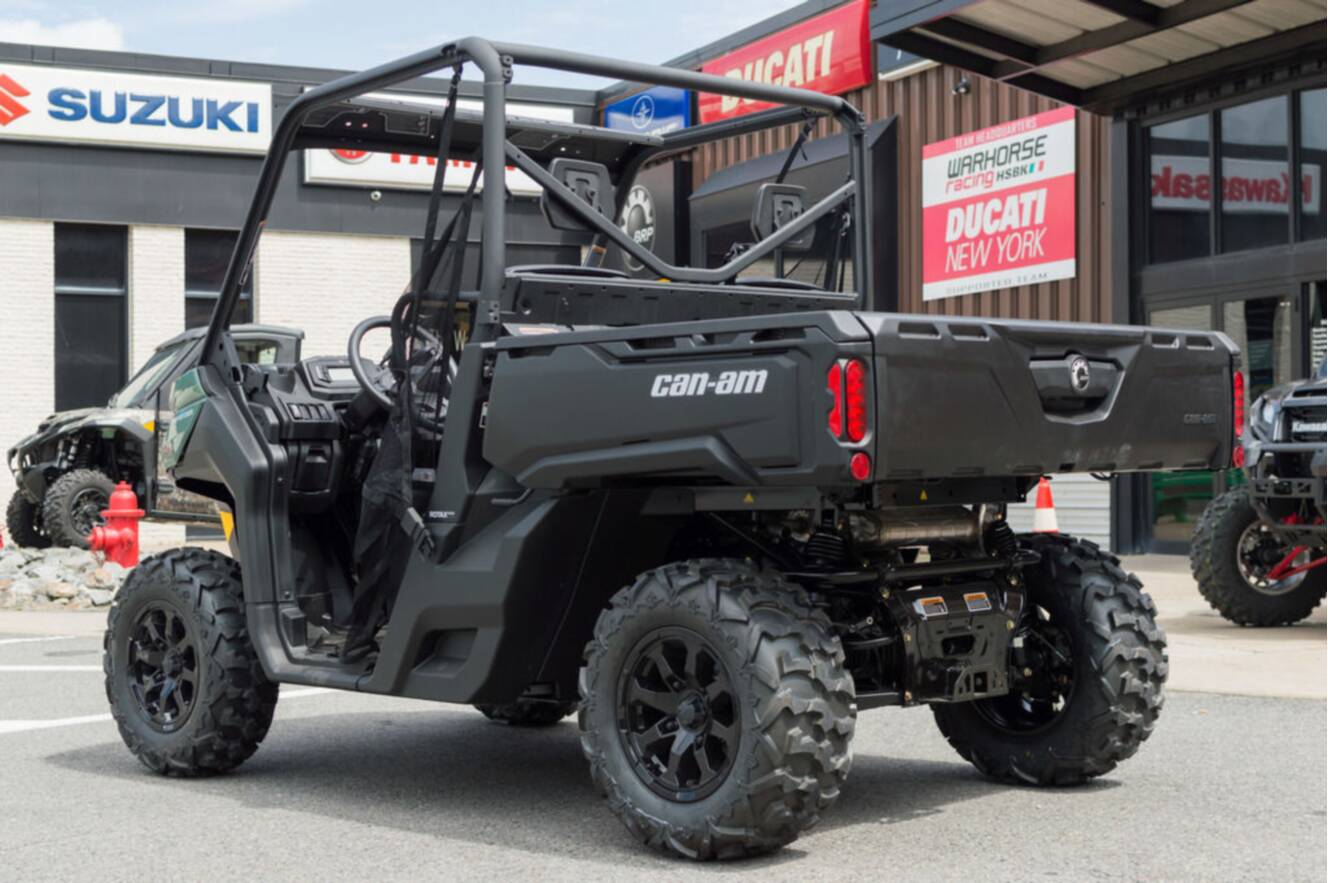 A photo of this 2026 Can-Am Defender DPS HD7 Compass Green