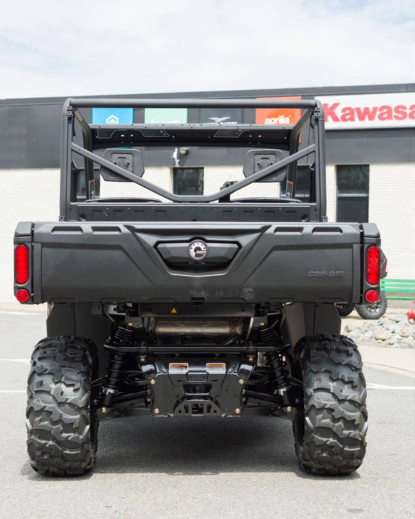 A photo of this 2026 Can-Am Defender DPS HD7 Compass Green