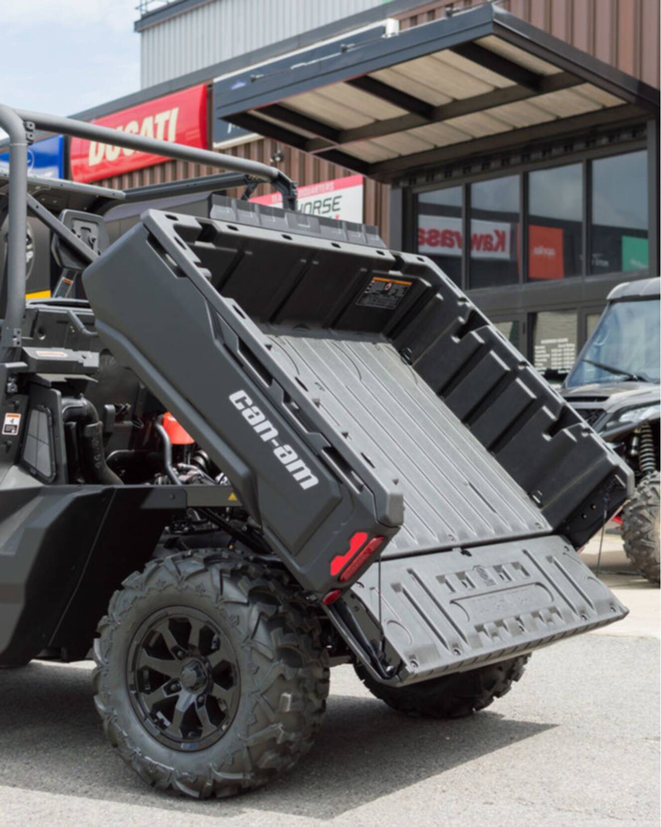 A photo of this 2026 Can-Am Defender DPS HD7 Compass Green