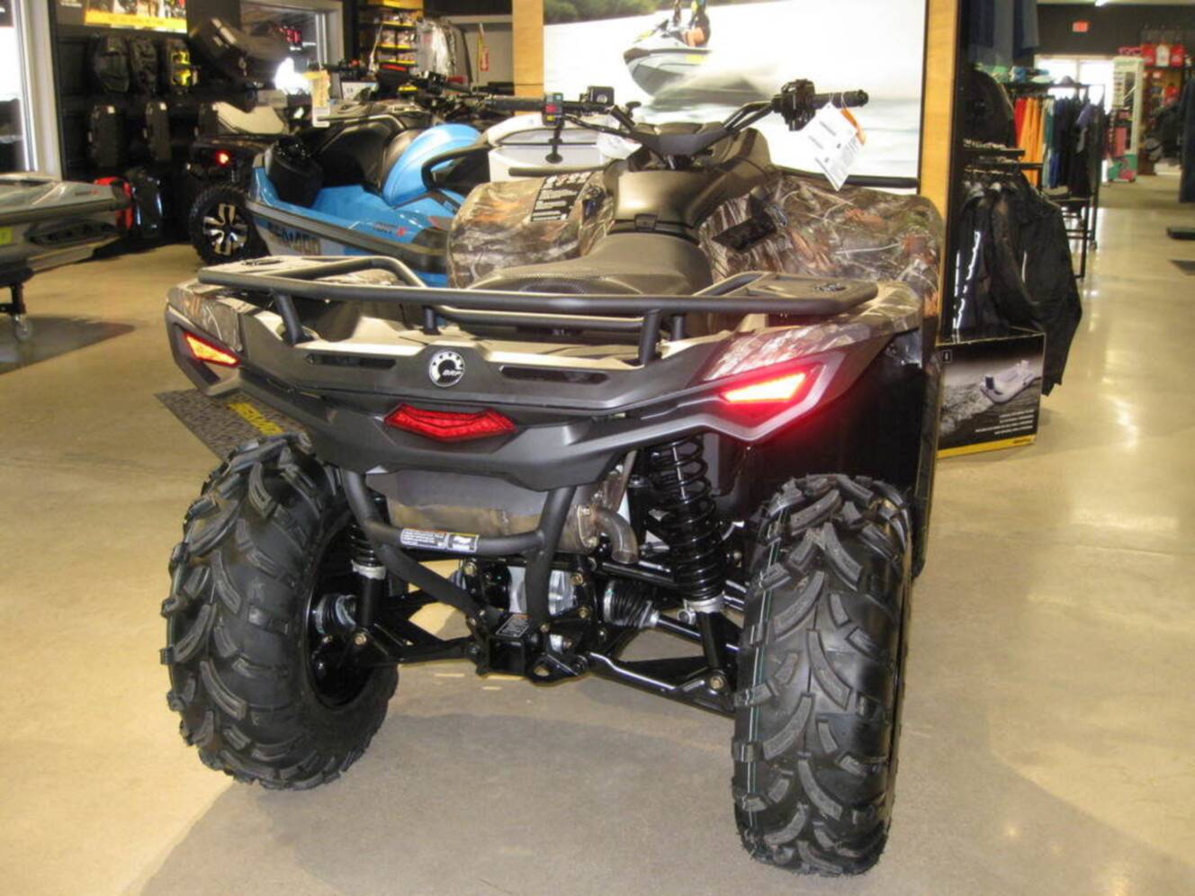 A photo of this 2026 Can-Am Outlander DPS 700 Wildland Camo