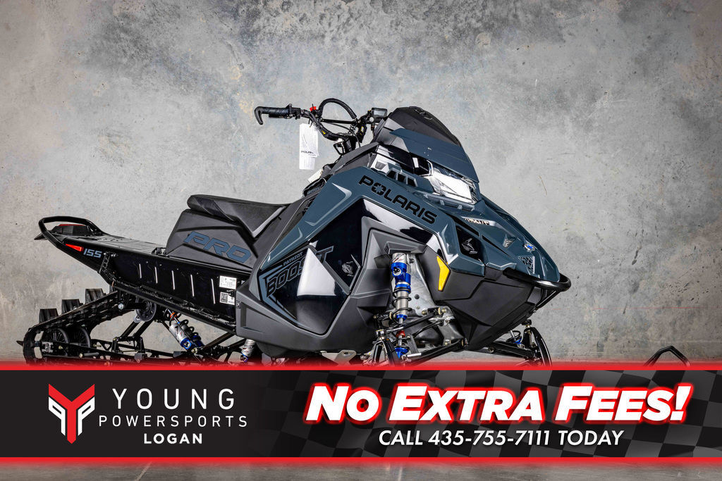 2026 Polaris® Patriot Boost RMK Khaos 155 Gloss Black / Blue Dusk in logan UT