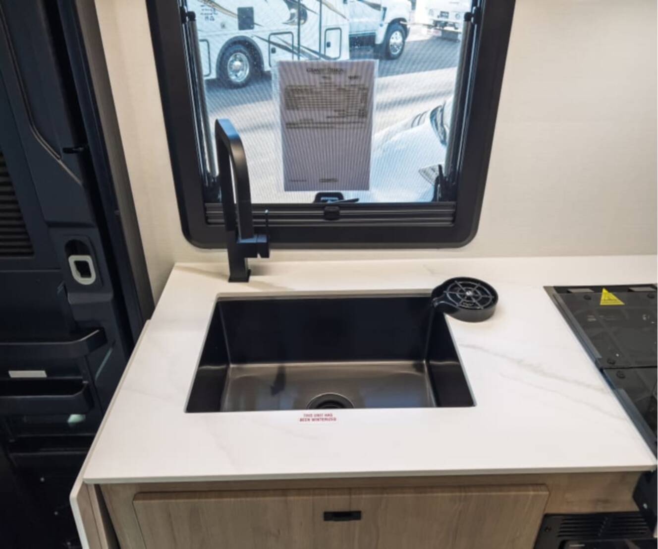 A photo of this 2027 Grand Design LINEAGE SERIES M 25TK-FBP