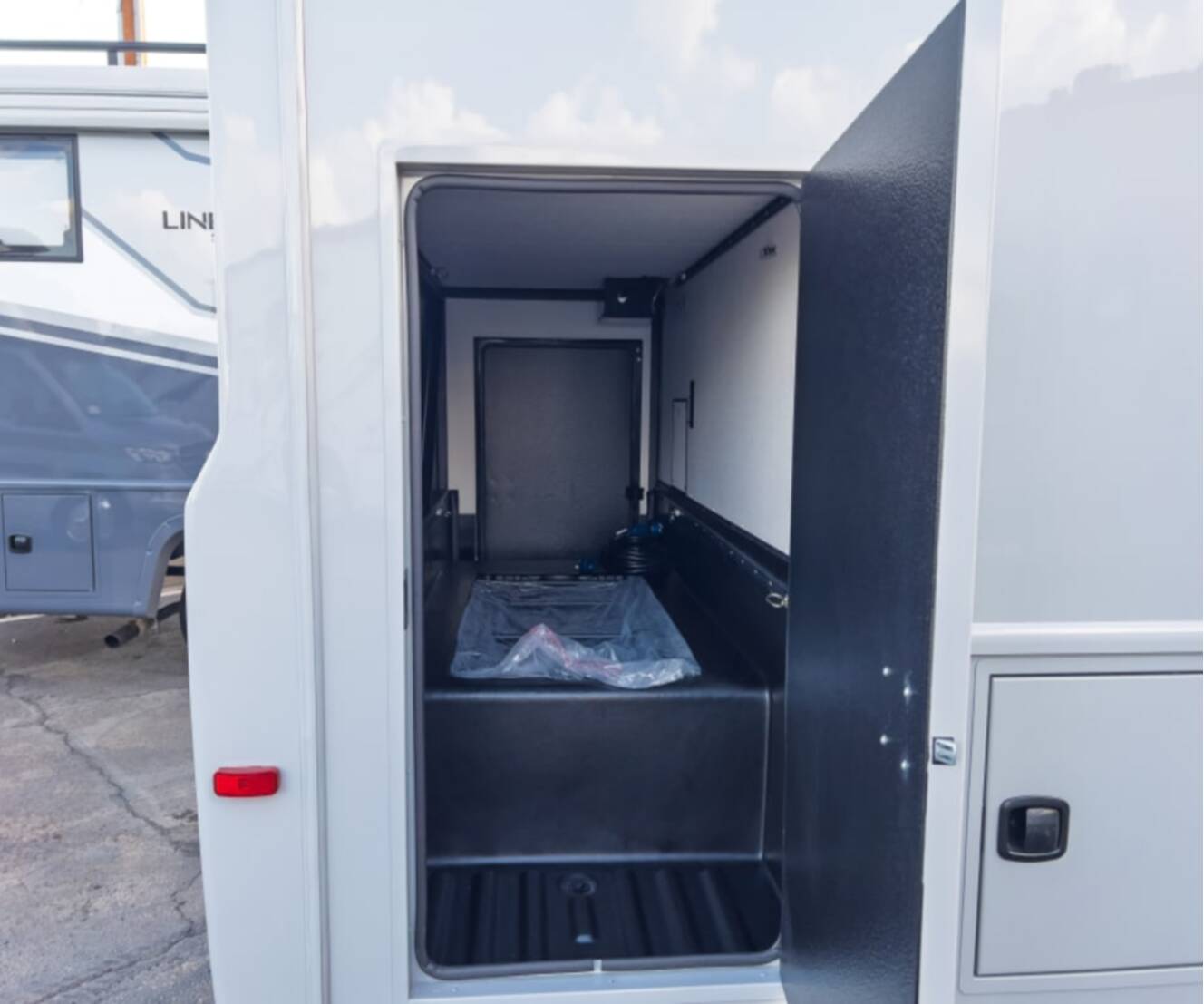 A photo of this 2027 Grand Design LINEAGE SERIES M 25TK-FBP