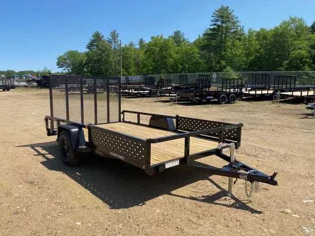 2027 SURE-TRAC 7x12 Powder Coated 3K ATV Trailer w/ Spare Tire Mount a in Loudon, NH