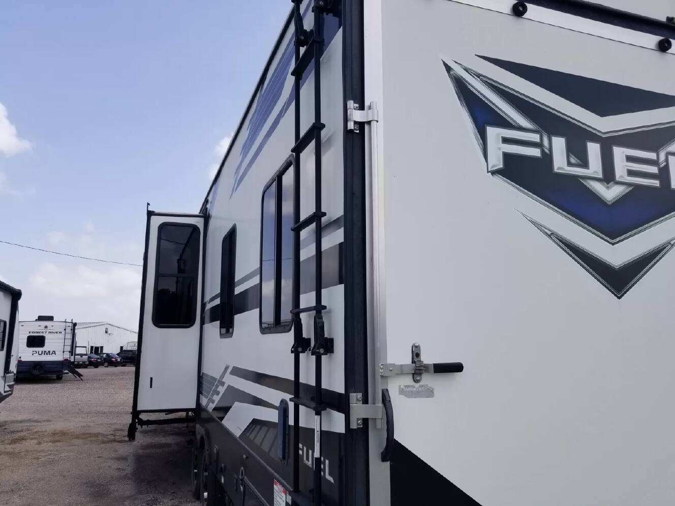 A photo of this 2021 Heartland Fuel 362 Toy Hauler