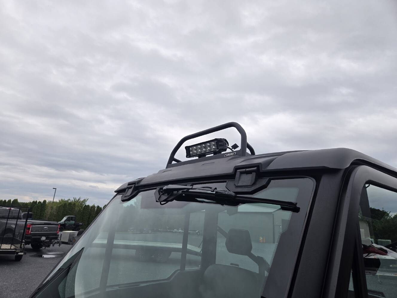 A photo of this 2026 Can-Am Defender DPS CAB HD10