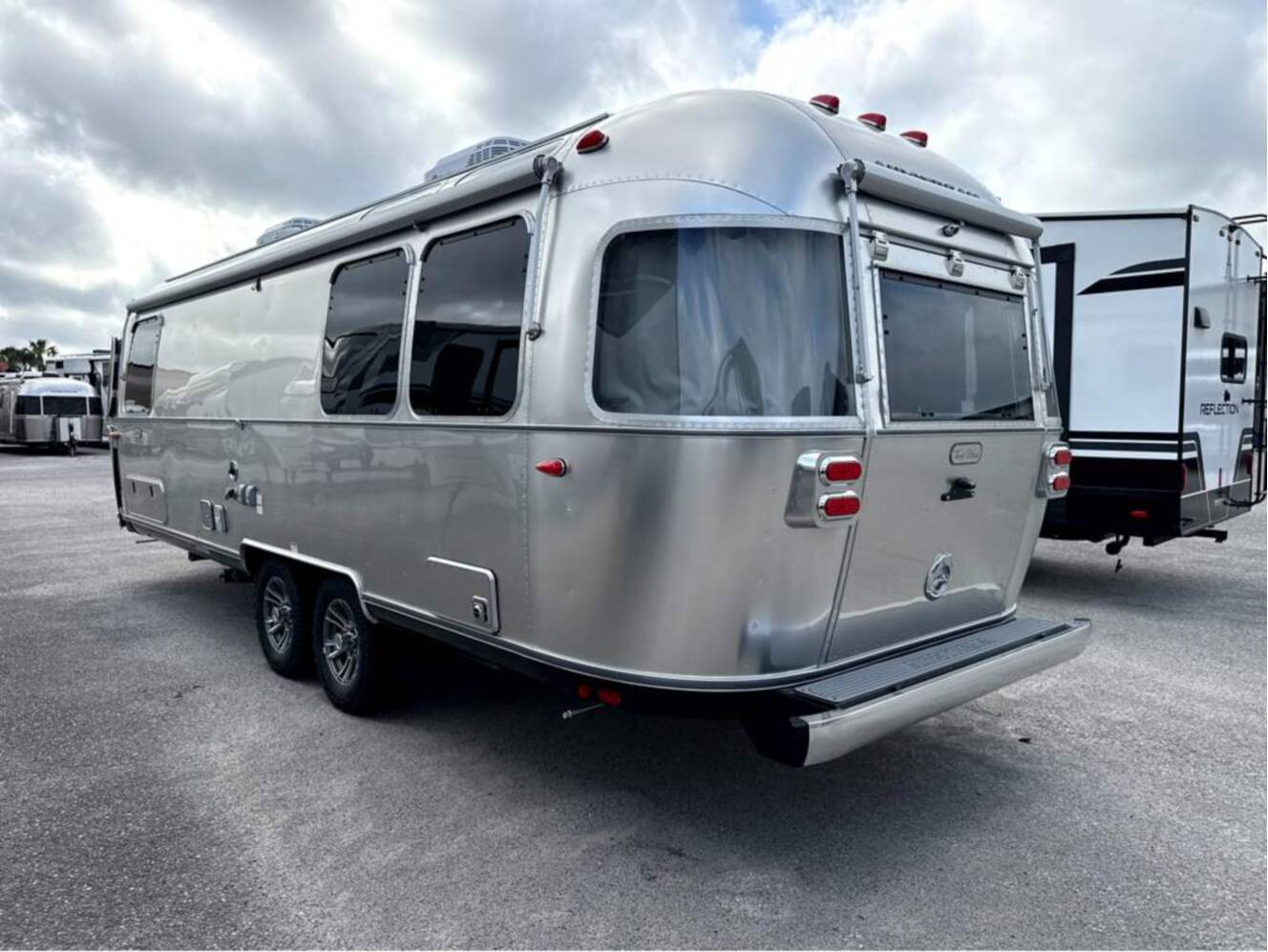 A photo of this 2027 Airstream Trade Wind 27FB Twin