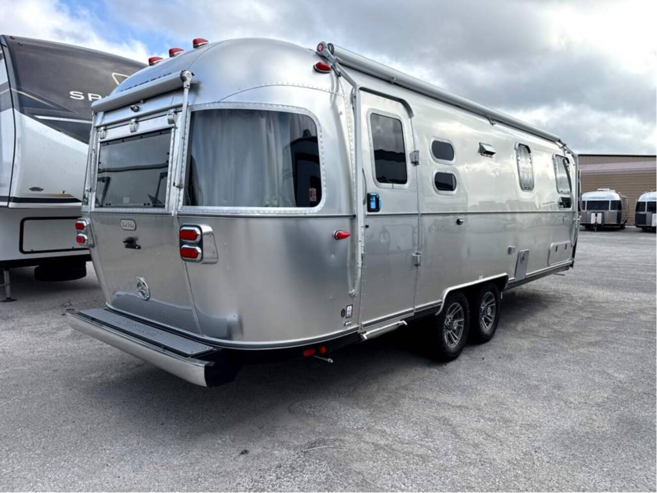 A photo of this 2027 Airstream Trade Wind 27FB Twin