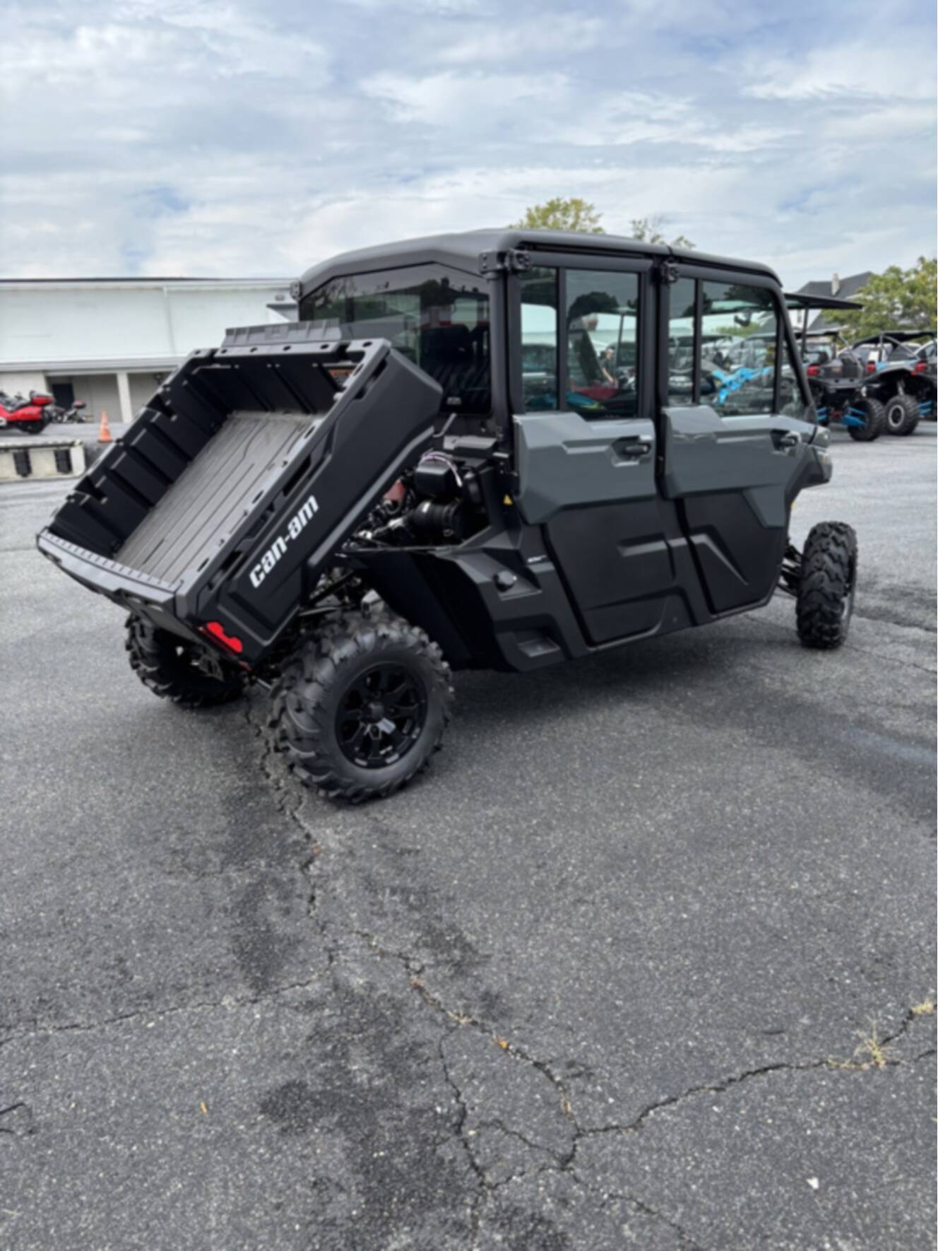 A photo of this 2027 Can-Am DEFENDER MAX DPS CAB HD10