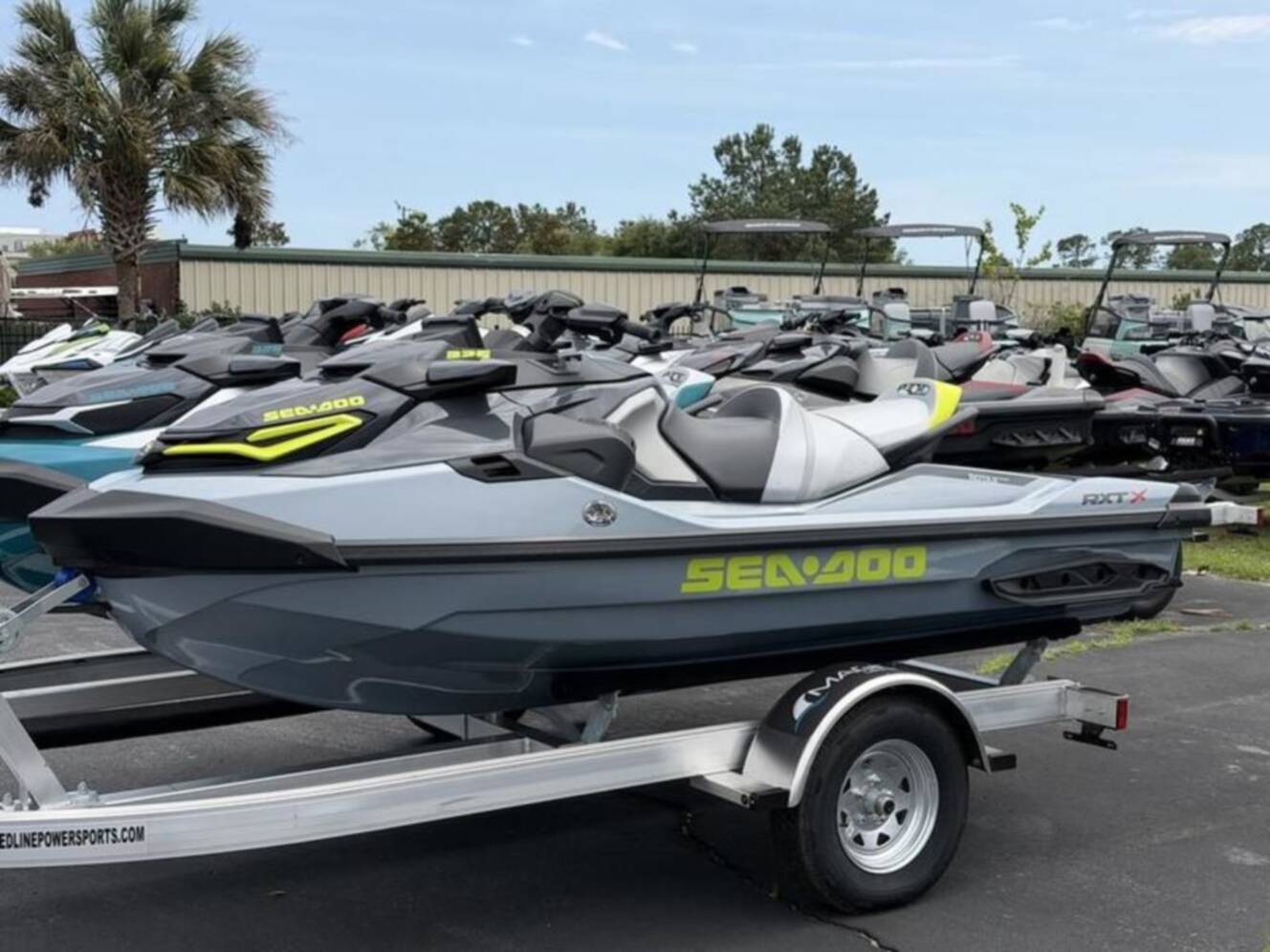 A photo of this 2026 Sea-Doo RXT-X 325 Ice Metal Manta Green