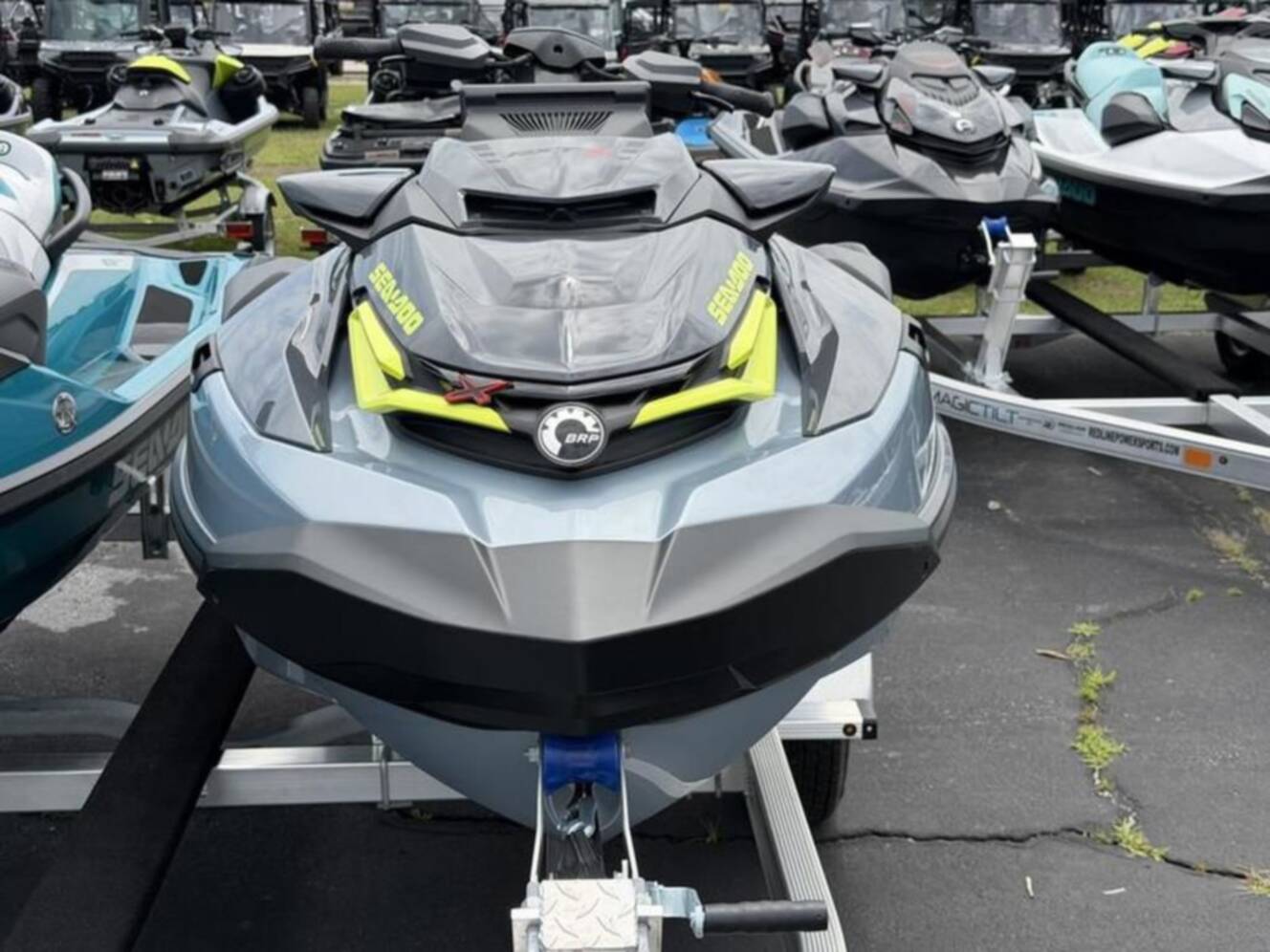 A photo of this 2026 Sea-Doo RXT-X 325 Ice Metal Manta Green