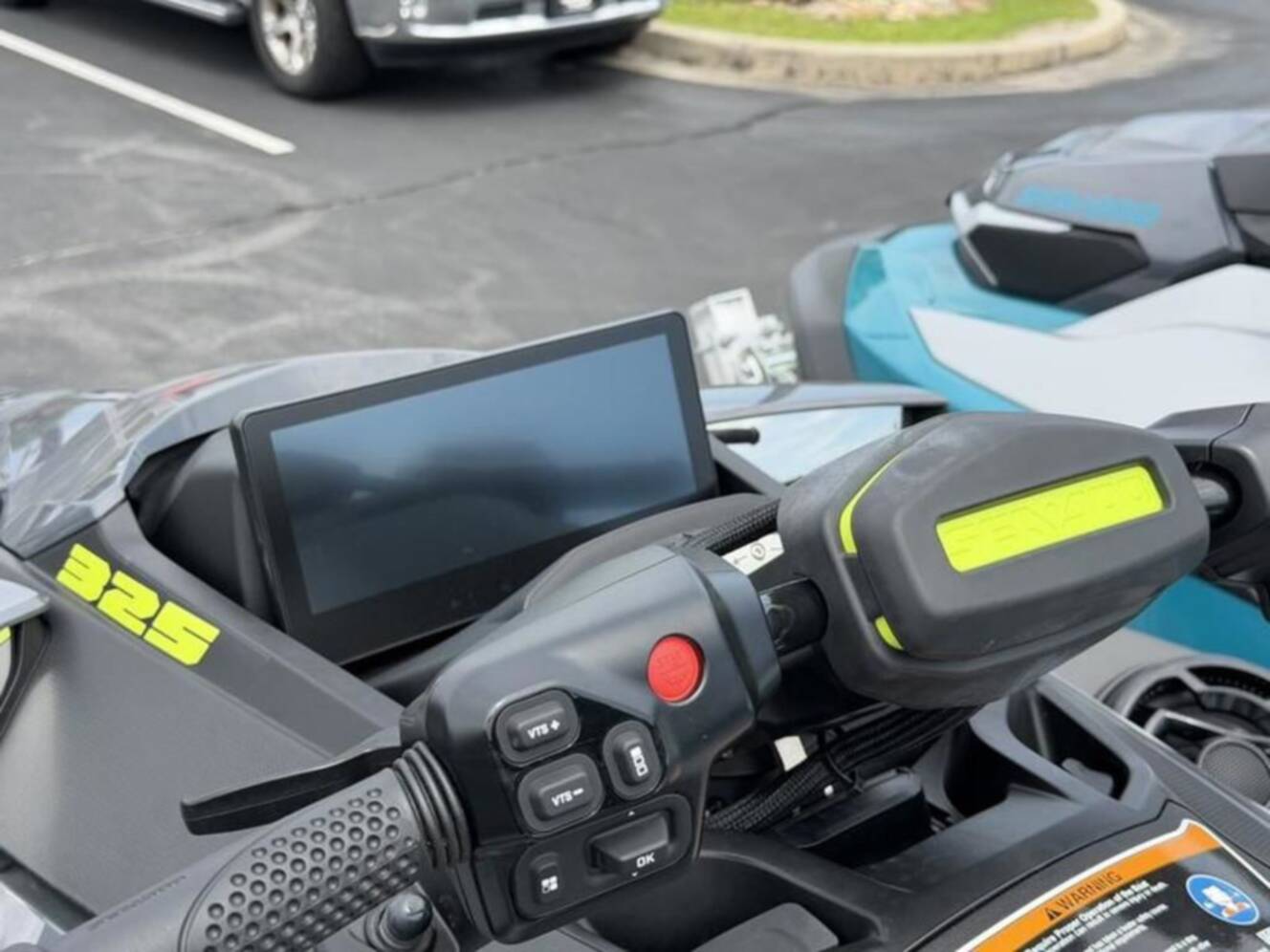 A photo of this 2026 Sea-Doo RXT-X 325 Ice Metal Manta Green