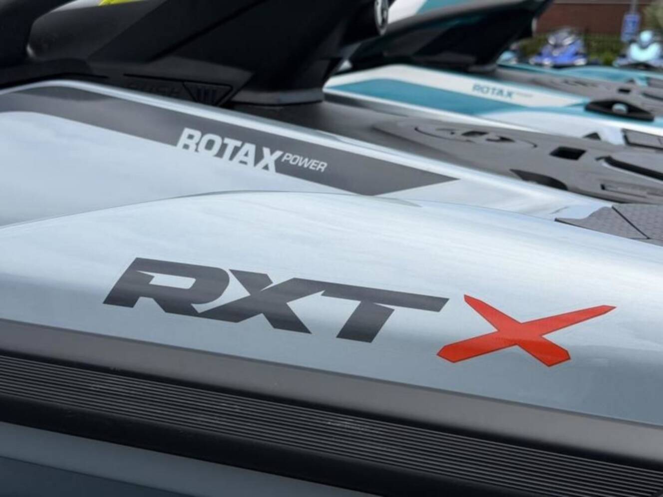 A photo of this 2026 Sea-Doo RXT-X 325 Ice Metal Manta Green