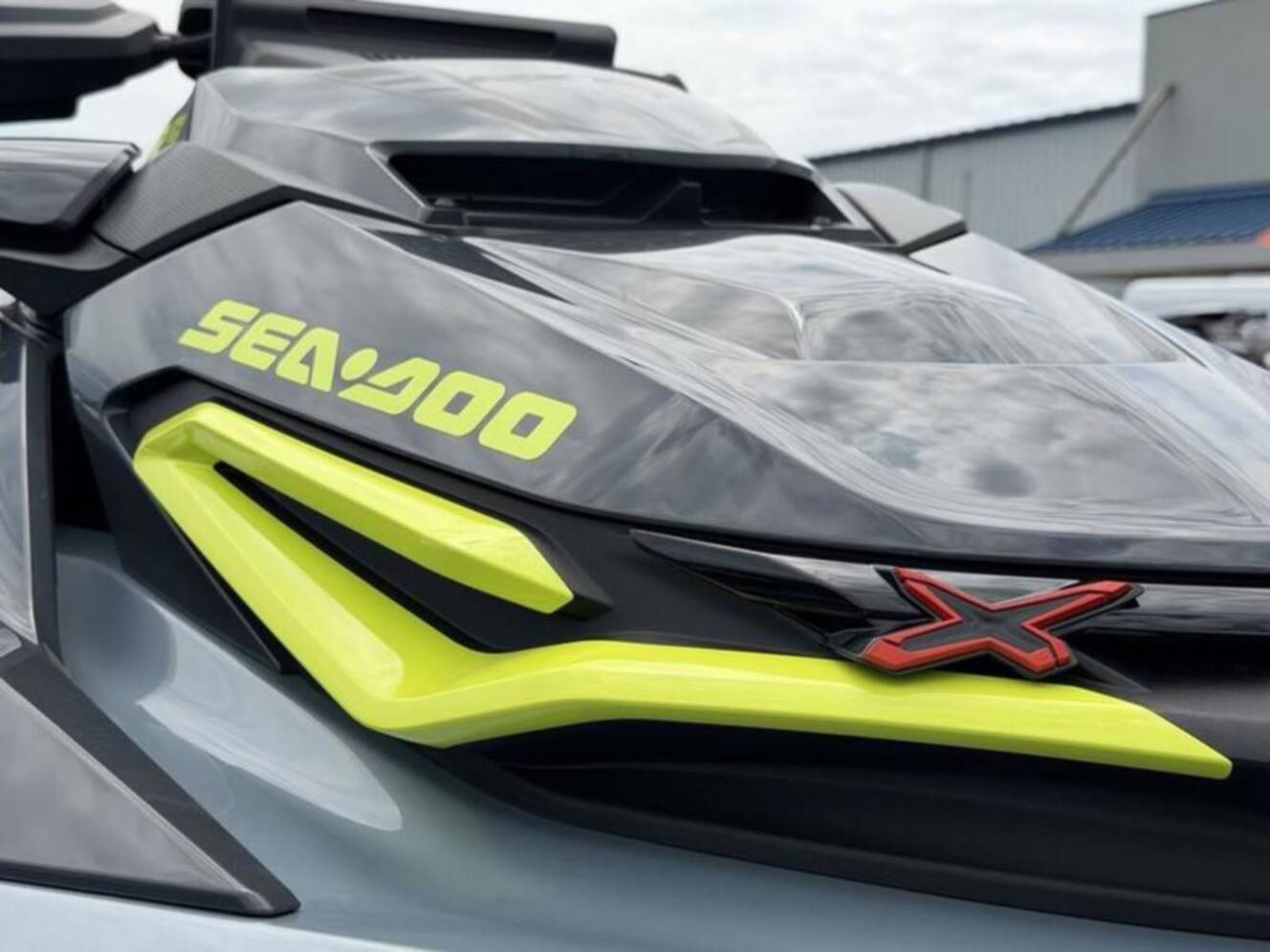 A photo of this 2026 Sea-Doo RXT-X 325 Ice Metal Manta Green