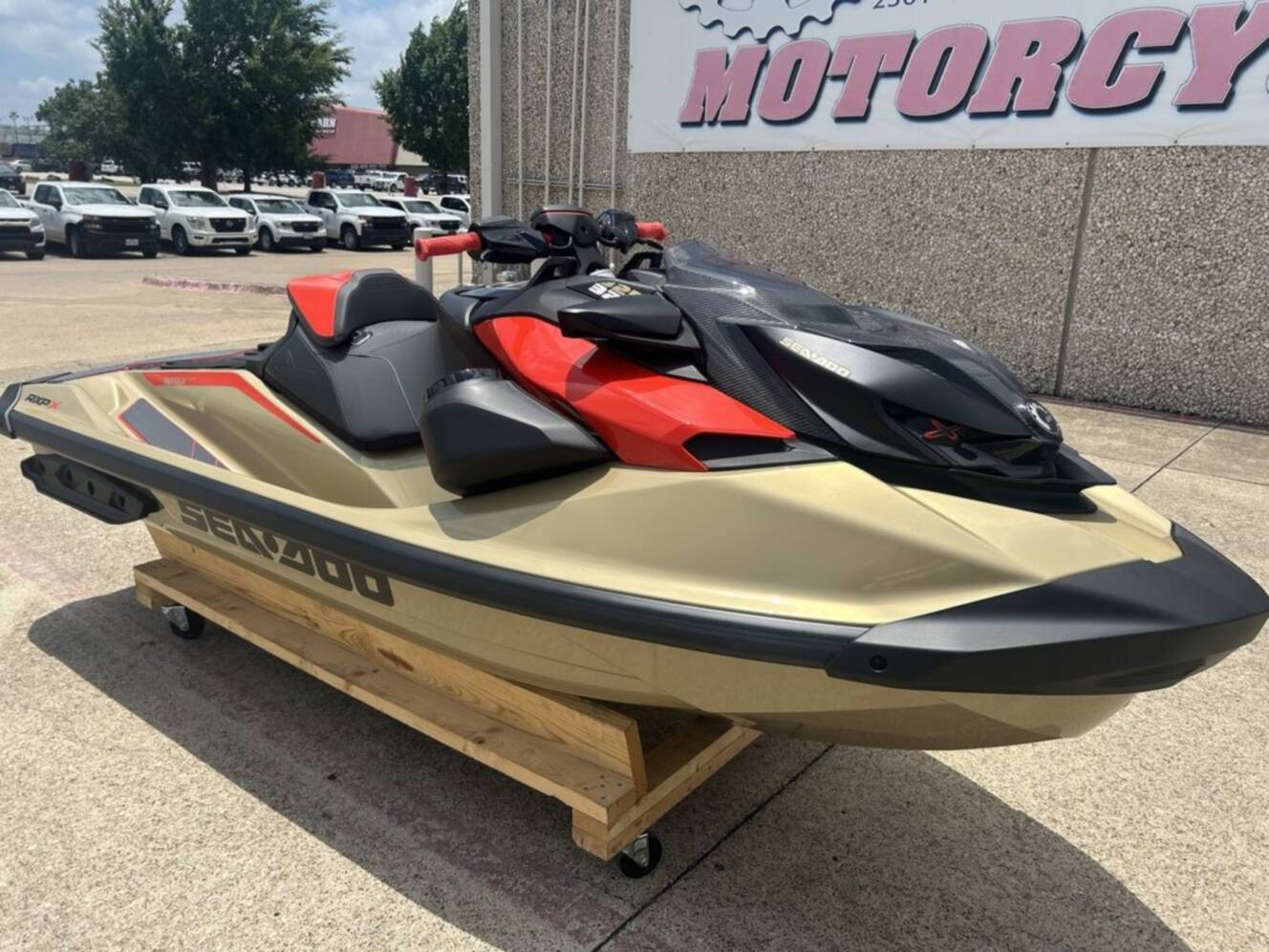A photo of this 2025 Sea-Doo RXP-X 325 Tech, BRP Premium A, iBR Metallic Tan / La