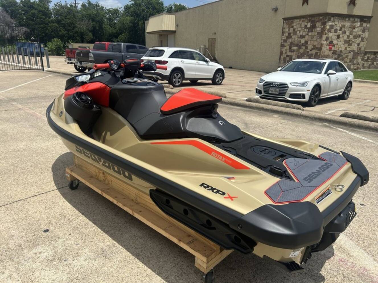 A photo of this 2025 Sea-Doo RXP-X 325 Tech, BRP Premium A, iBR Metallic Tan / La