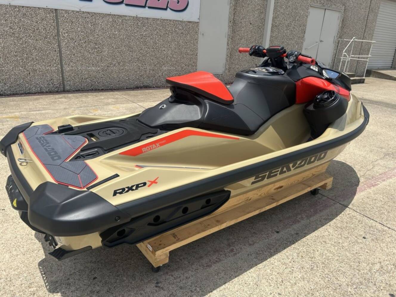 A photo of this 2025 Sea-Doo RXP-X 325 Tech, BRP Premium A, iBR Metallic Tan / La