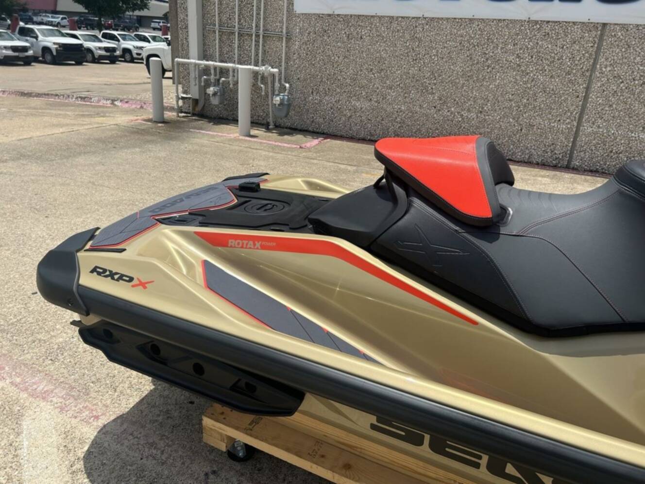 A photo of this 2025 Sea-Doo RXP-X 325 Tech, BRP Premium A, iBR Metallic Tan / La