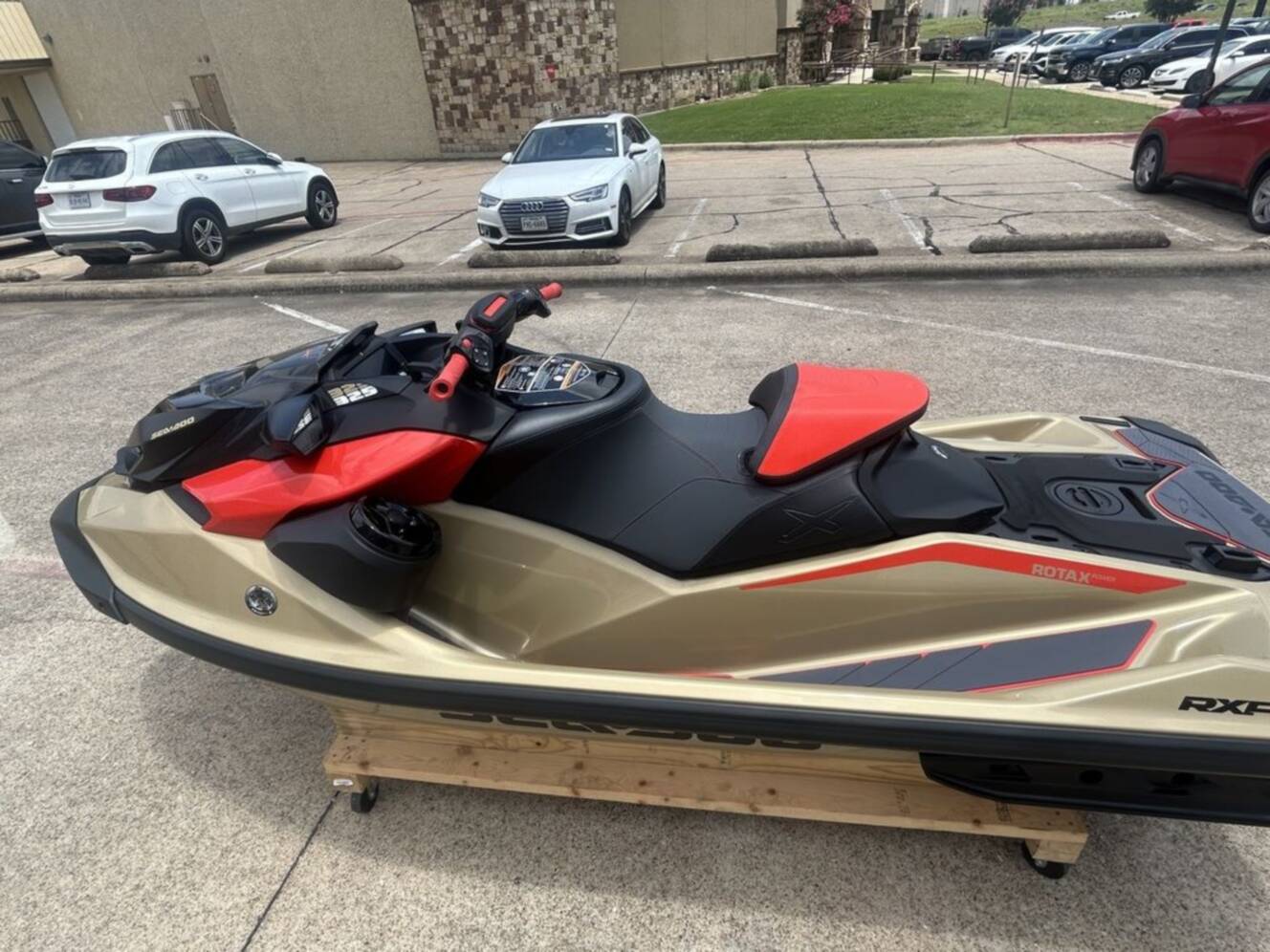 A photo of this 2025 Sea-Doo RXP-X 325 Tech, BRP Premium A, iBR Metallic Tan / La