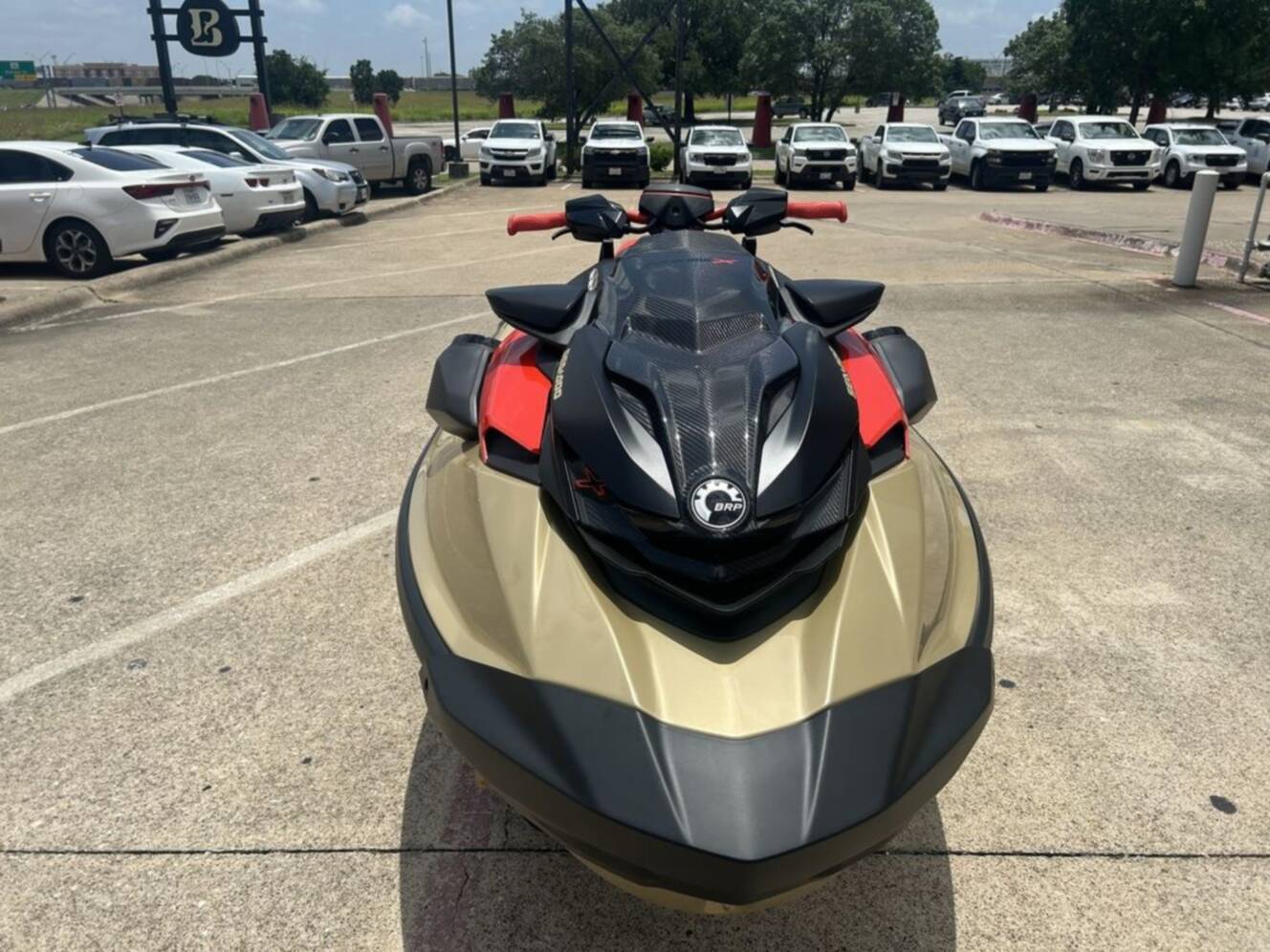 A photo of this 2025 Sea-Doo RXP-X 325 Tech, BRP Premium A, iBR Metallic Tan / La