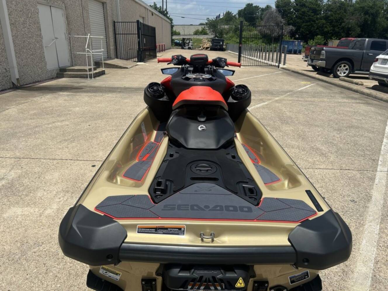A photo of this 2025 Sea-Doo RXP-X 325 Tech, BRP Premium A, iBR Metallic Tan / La