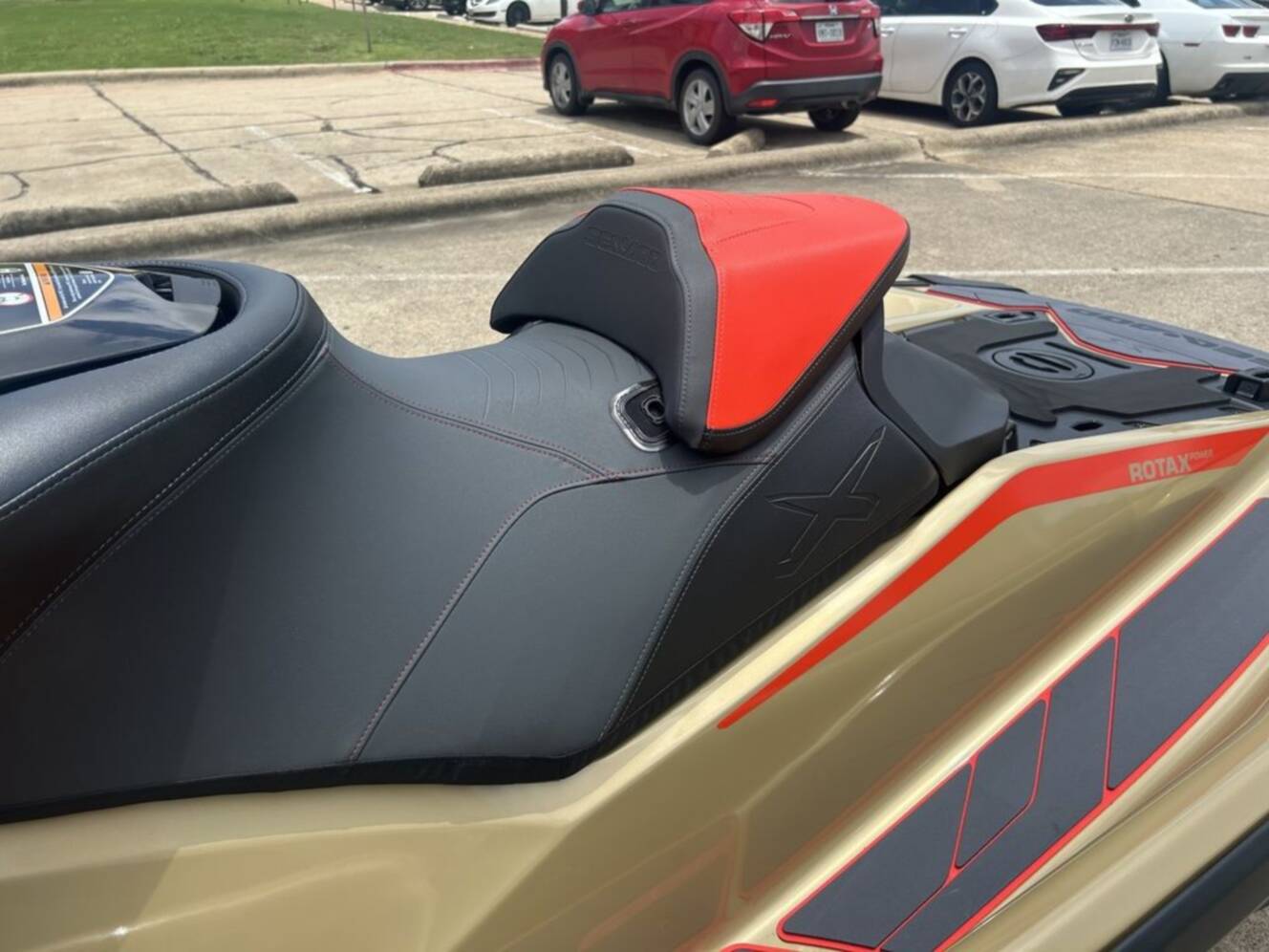 A photo of this 2025 Sea-Doo RXP-X 325 Tech, BRP Premium A, iBR Metallic Tan / La