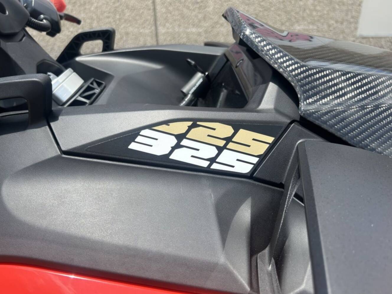 A photo of this 2025 Sea-Doo RXP-X 325 Tech, BRP Premium A, iBR Metallic Tan / La
