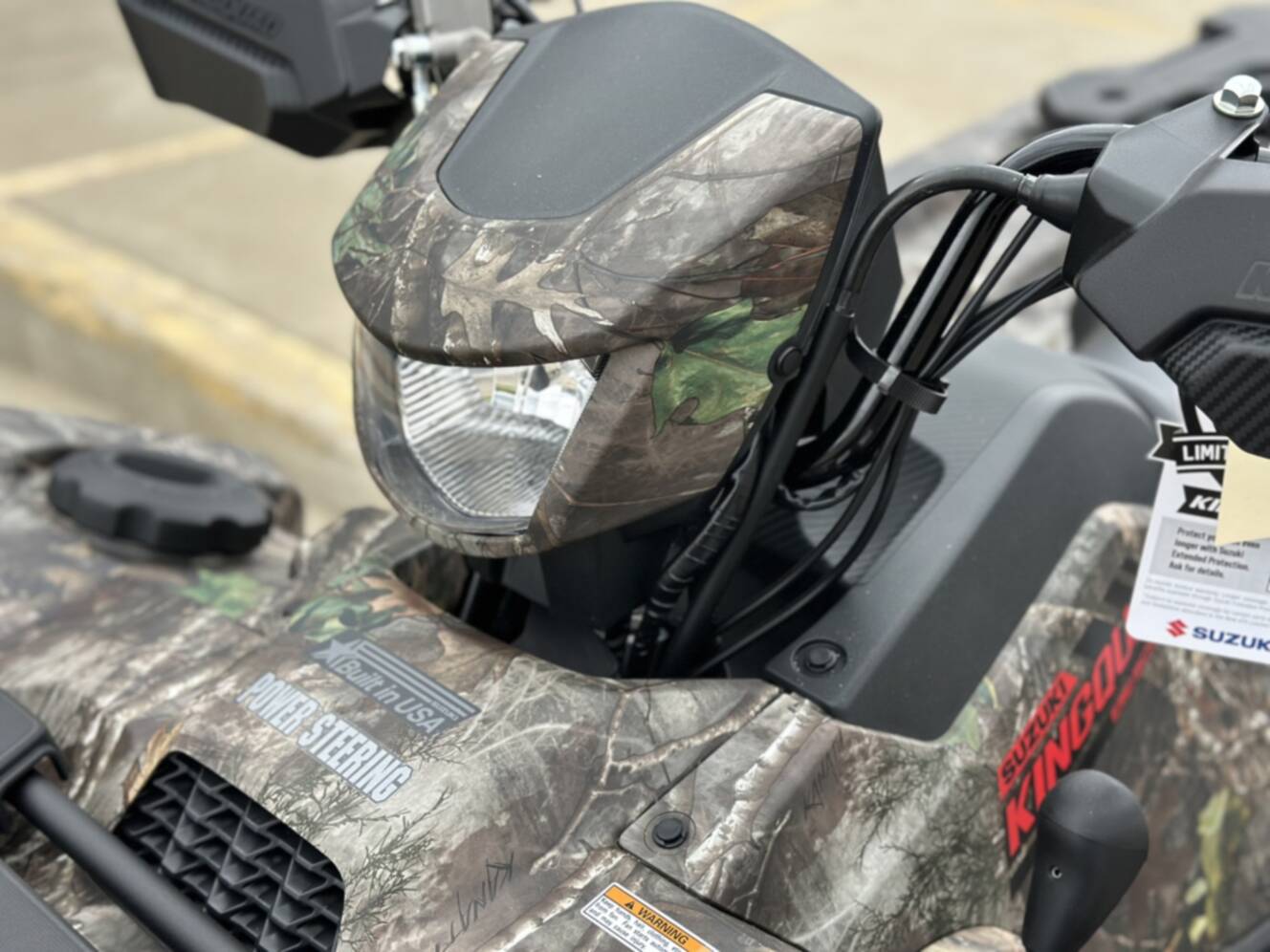 A photo of this 2025 Suzuki KingQuad 500 AXi Power Steering SE Camo
