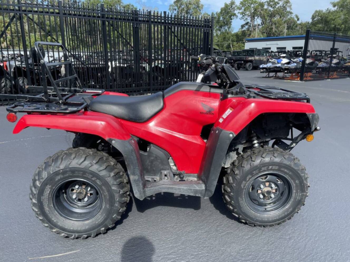 A photo of this 2024 Honda FourTrax Rancher 4X4 Automatic DCT EPS
