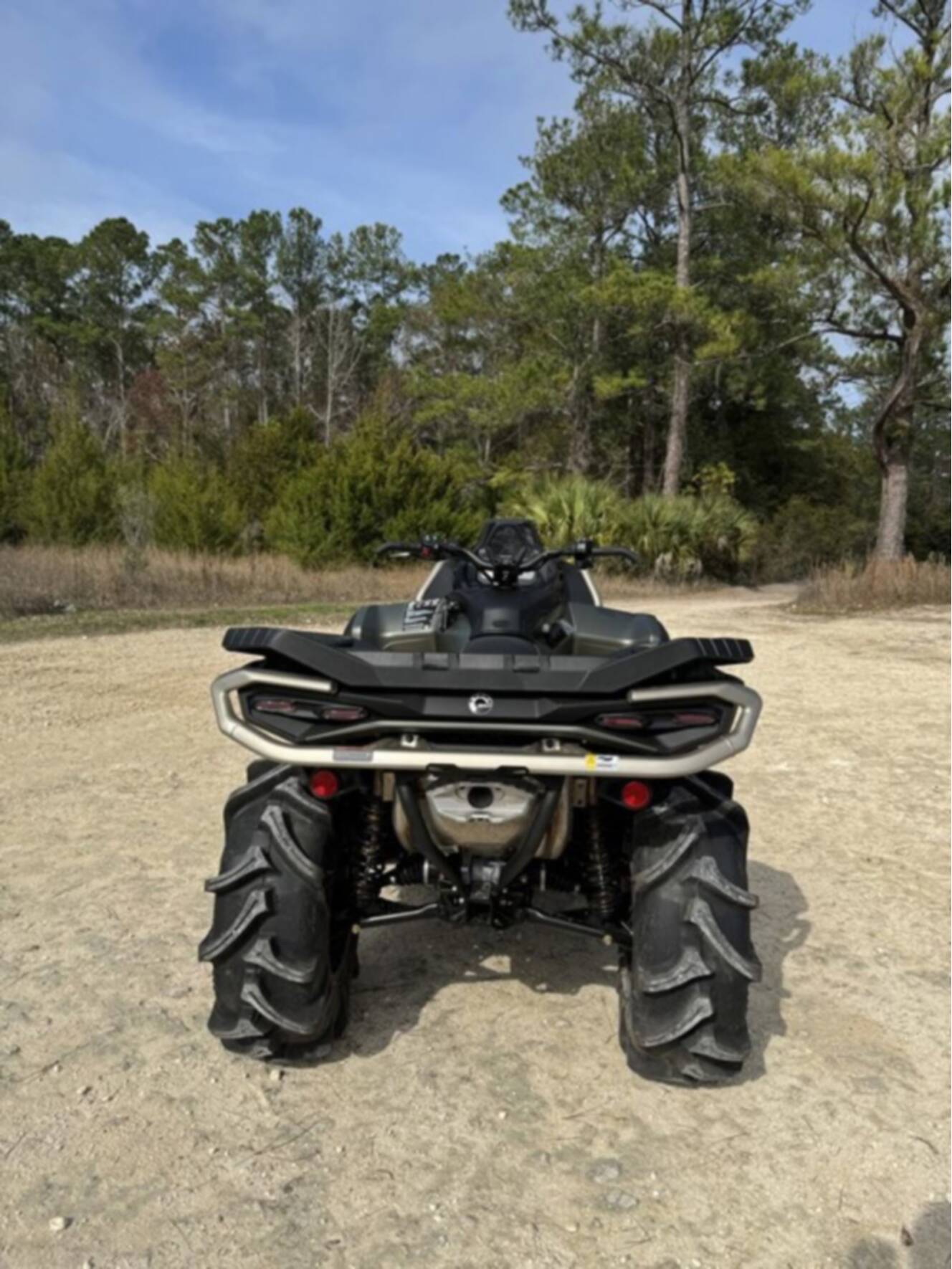A photo of this 2026 Can-Am Outlander X Mr 1000R Loft Green Satin