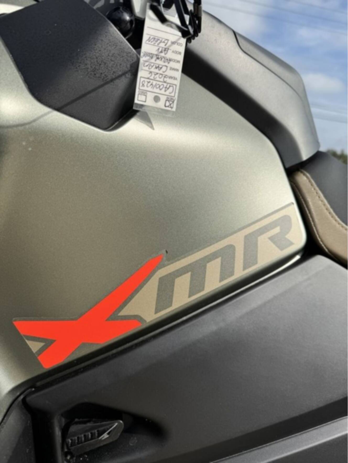 A photo of this 2026 Can-Am Outlander X Mr 1000R Loft Green Satin