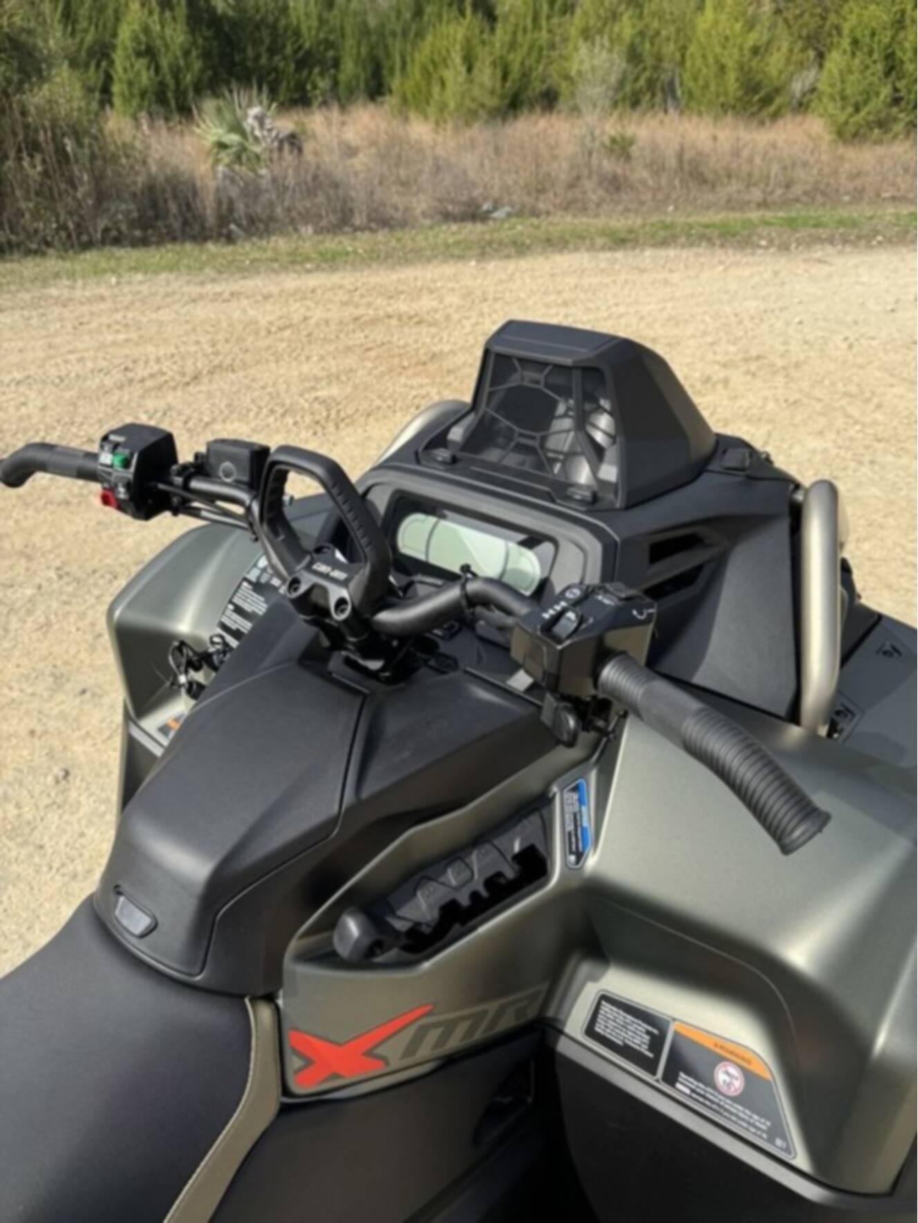 A photo of this 2026 Can-Am Outlander X Mr 1000R Loft Green Satin