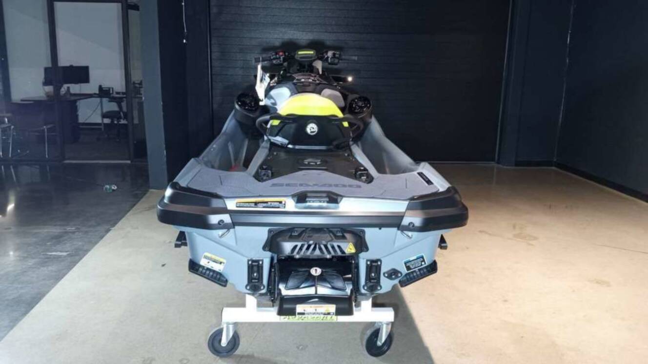 A photo of this 2026 Sea-Doo RXT-X 325 Ice Metal / Manta Green