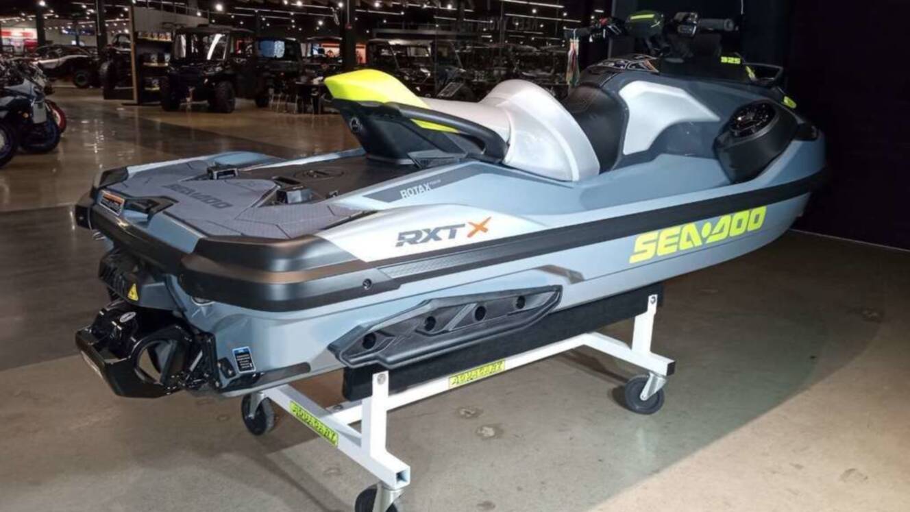 A photo of this 2026 Sea-Doo RXT-X 325 Ice Metal / Manta Green