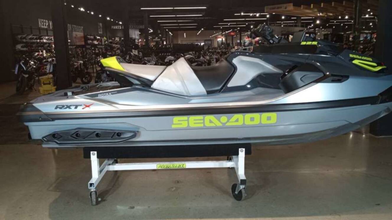A photo of this 2026 Sea-Doo RXT-X 325 Ice Metal / Manta Green