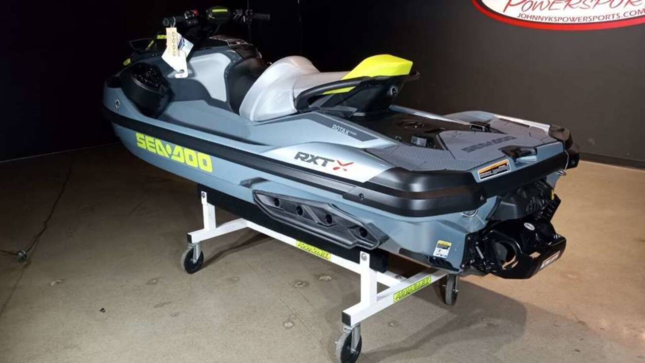 A photo of this 2026 Sea-Doo RXT-X 325 Ice Metal / Manta Green