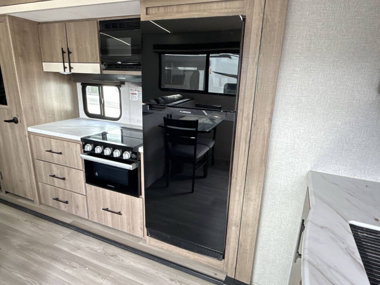 A photo of this 2024 Grand Design IMAGINE 3100RD