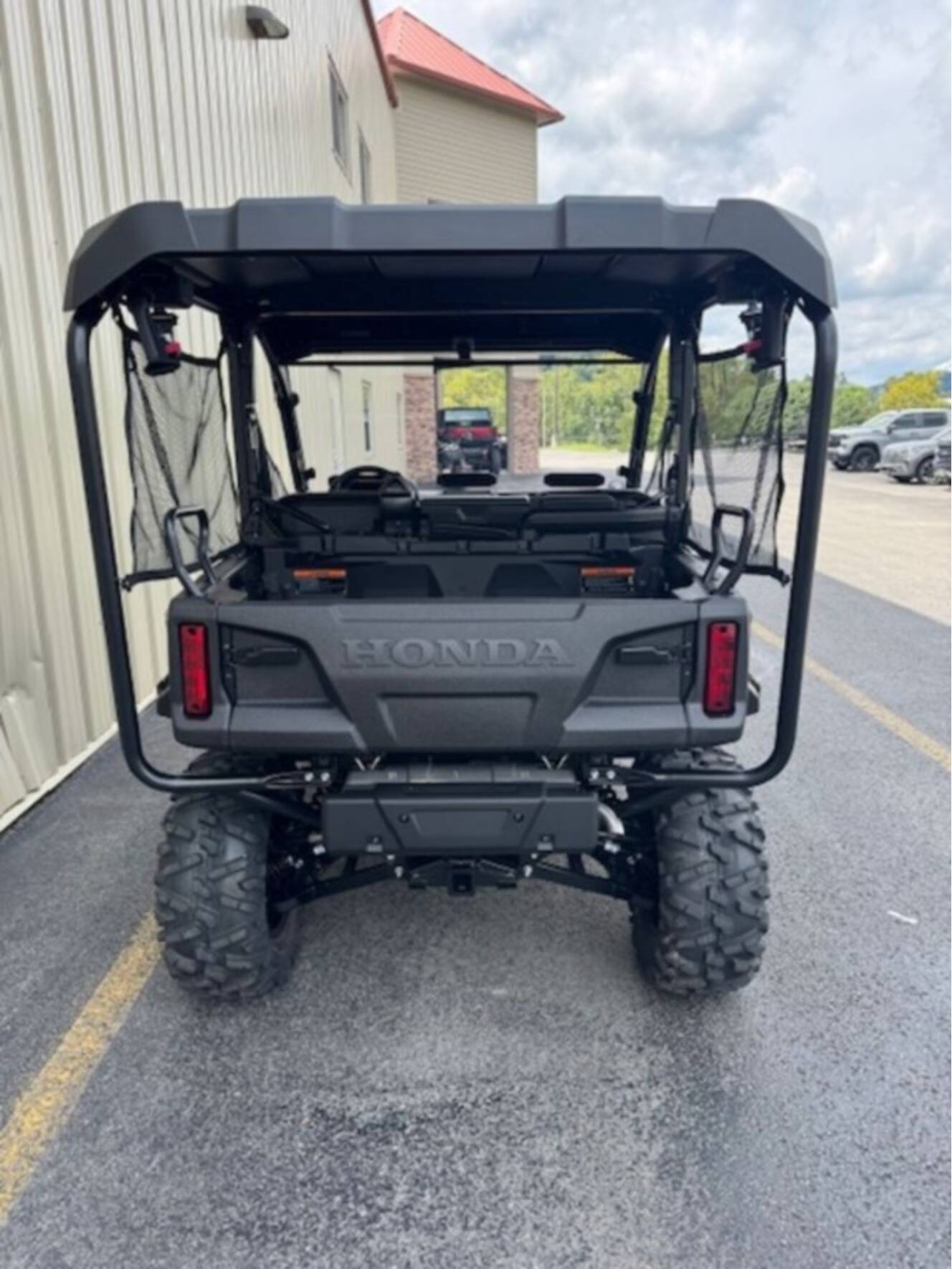 A photo of this 2026 Honda® Pioneer 1000-5 Deluxe TrueTimber Atera Camo