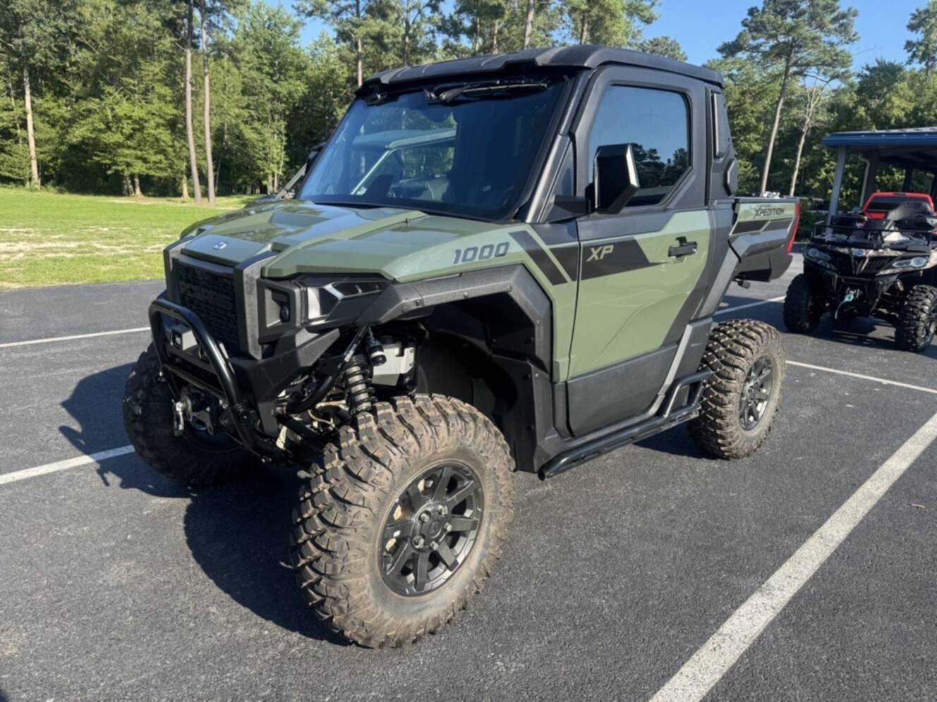 A photo of this 2024 Polaris XPEDITION XP 1000 NSTR Army Green