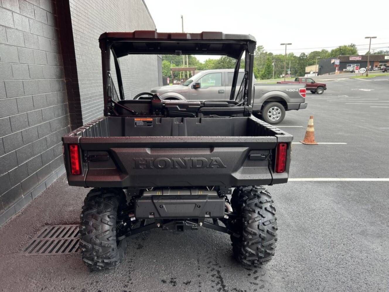 A photo of this 2026 Honda® Pioneer 1000 Deluxe TrueTimber atera camo