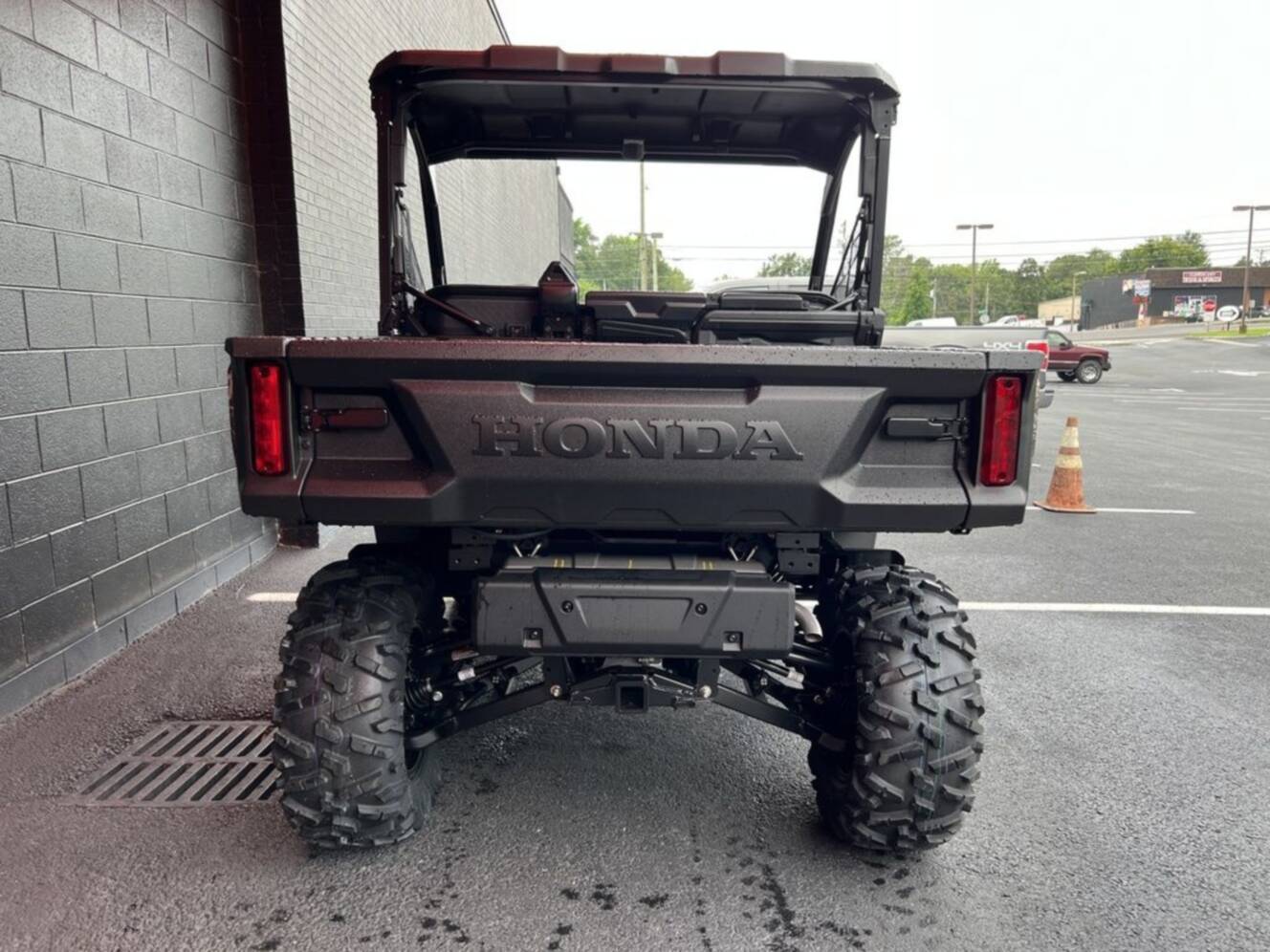 A photo of this 2026 Honda® Pioneer 1000 Deluxe TrueTimber atera camo