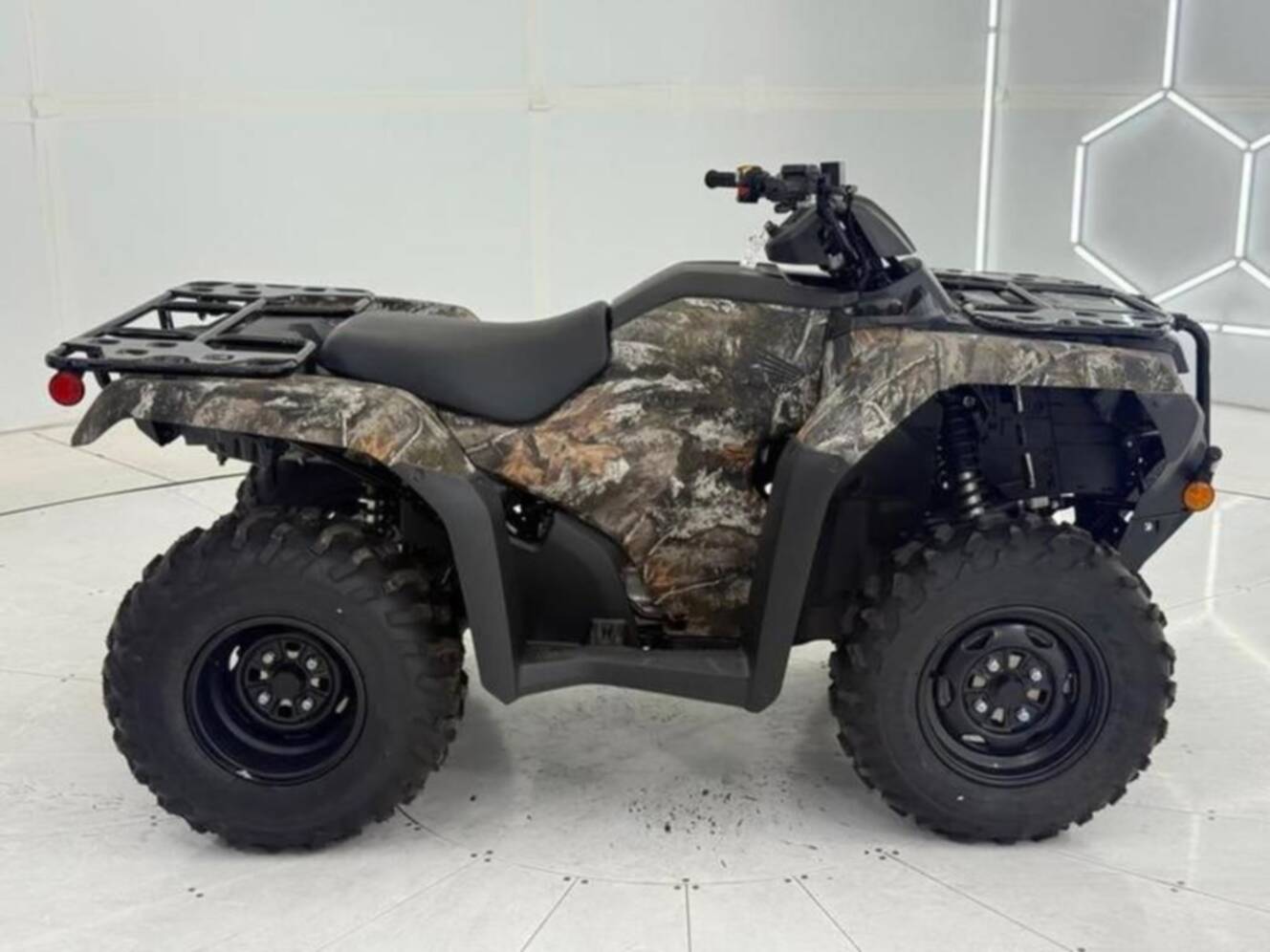 A photo of this 2027 Honda  FourTrax Rancher 4X4 TrueTimber Atera Camo