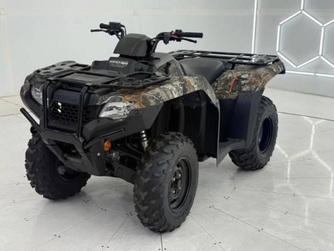 A photo of this 2027 Honda  FourTrax Rancher 4X4 TrueTimber Atera Camo