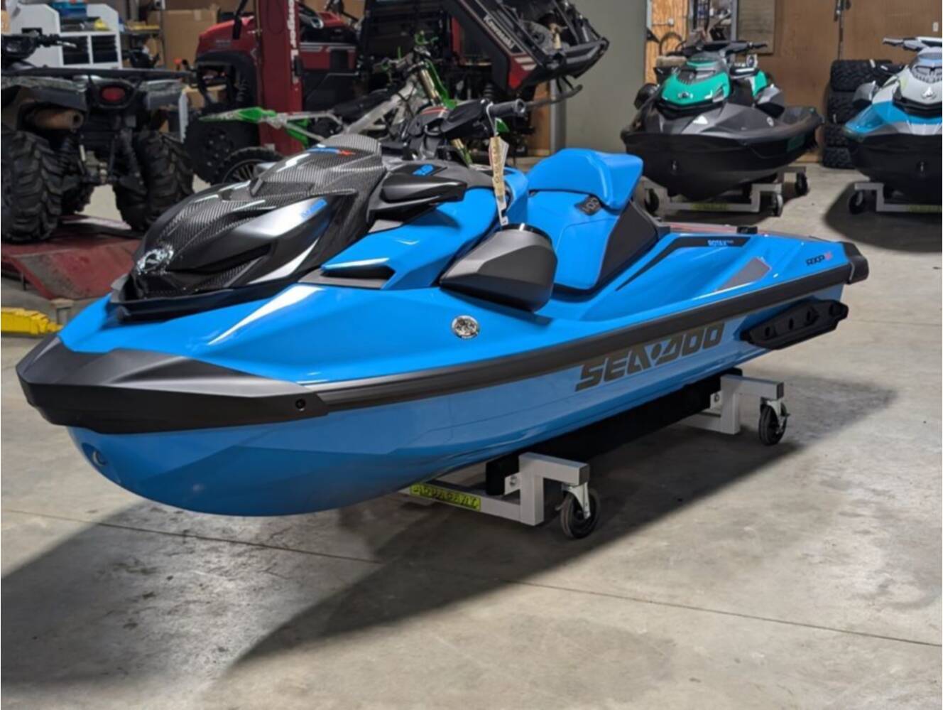 A photo of this 2026 Sea-Doo RXP-X 325 Tech, BRP Premium A, iBR Gulfstream Blue P