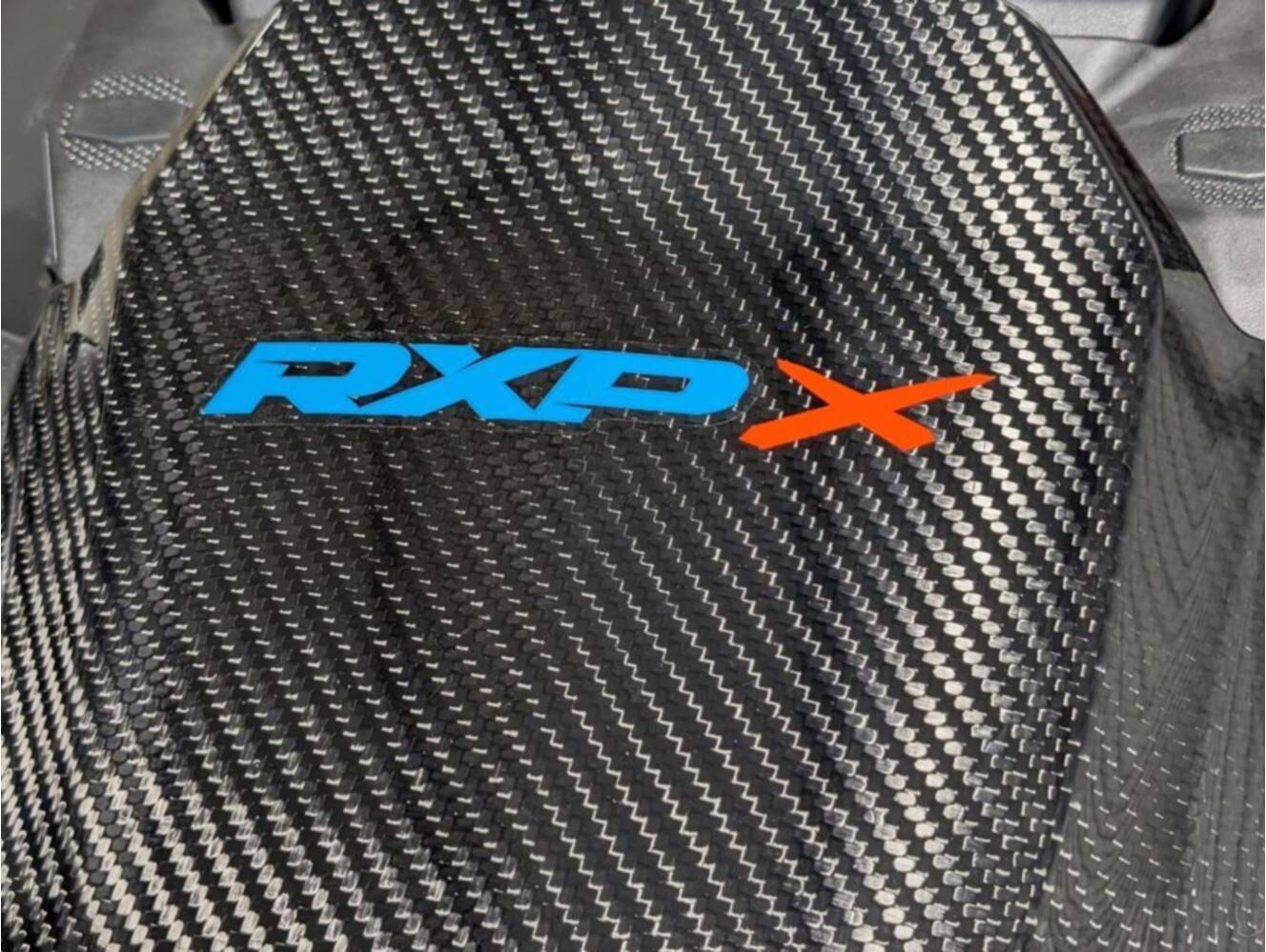 A photo of this 2026 Sea-Doo RXP-X 325 Tech, BRP Premium A, iBR Gulfstream Blue P